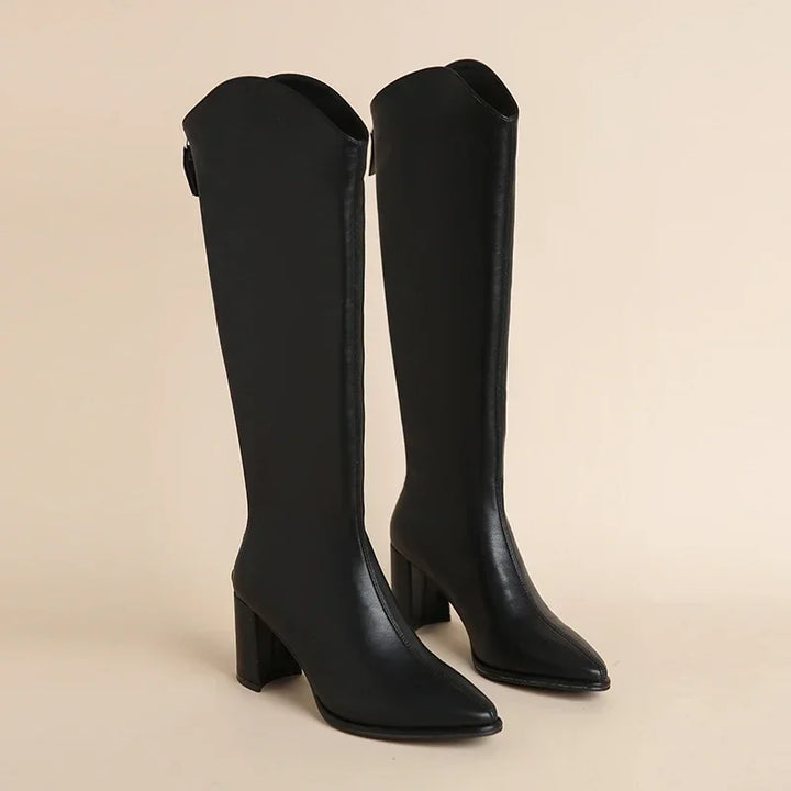 Women's black leather block heel knee-high boots with a sharp pointed toe & easy back zip. Perfect for everyday.