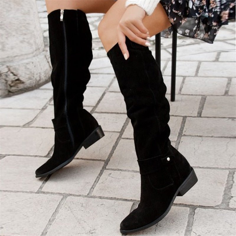 Versatile women's pull-on slouch knee high boots. Comfortable block heel for elegant fall and winter style.