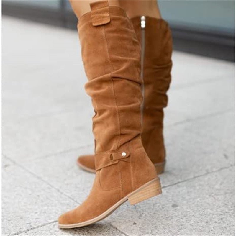 Women's comfortable slouchy knee high boots, elegant design with block heel. Perfect for winter fashion.