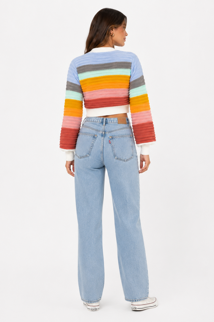 Stylish women's layered rainbow stripe button-up V-neck cardigan, perfect for spring.