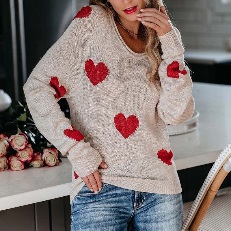 Warm women's heart print V-neck knitwear, long sleeve, for cozy winter fashion.