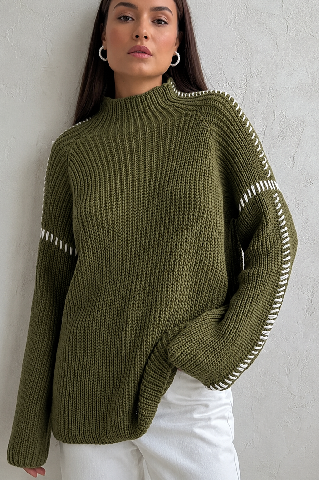 Cozy women's relaxed fit oversized chunky knit sweater with a warm mock neck & unique stitch detail.