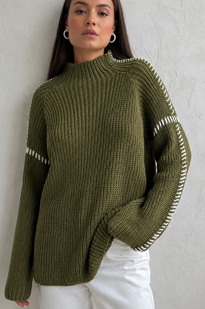 Cozy women's relaxed fit oversized chunky knit sweater with a warm mock neck & unique stitch detail.