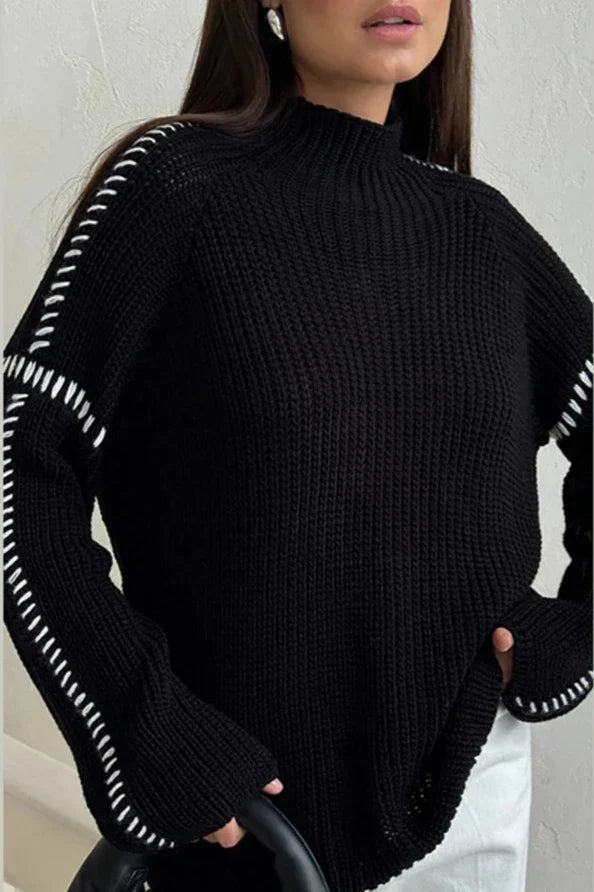 Versatile women's chunky knit mock neck jumper for casual wear. Oversized fit with unique stitch detail.