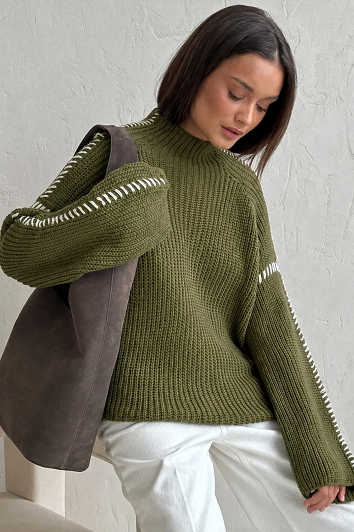 Women's oversized chunky knit jumper with a mock neck & stylish contrast stitch detail. Perfect for fall & winter.