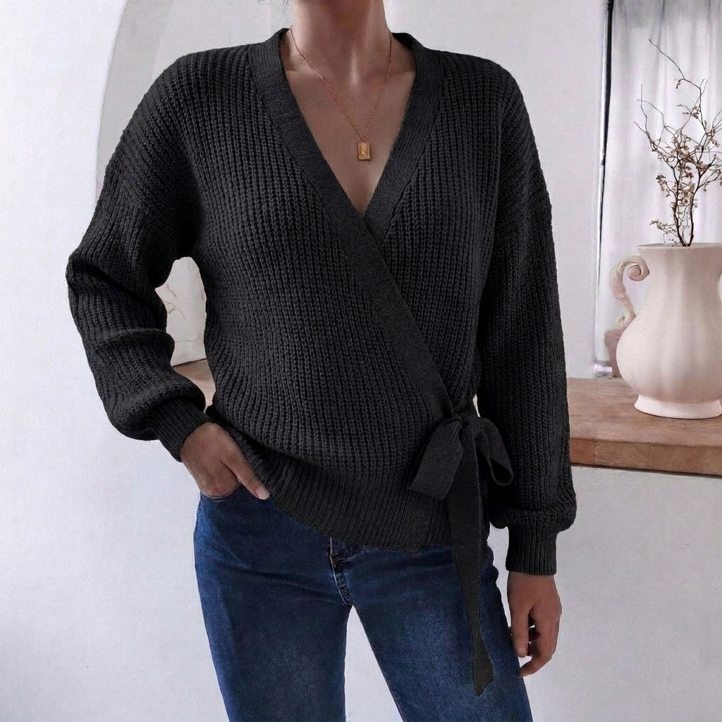 One size women's knitted jumper, featuring a trendy wrap front and practical tie waist. Casual yet elegant.