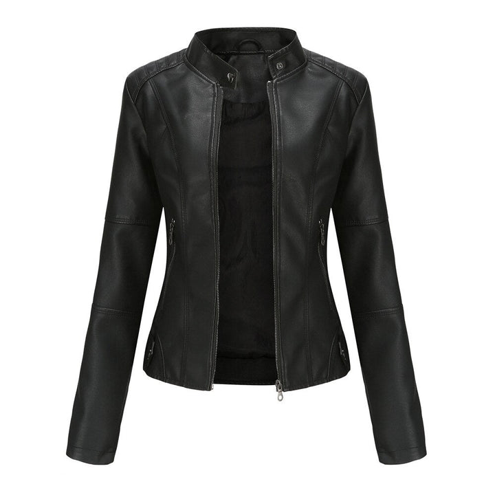 Close-up of a women's chic mandarin collar leather jacket, highlighting the unique neckline & edgy design.