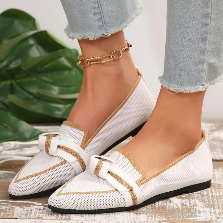 Chic women's pointed toe loafers, perfect for adding a touch of elegance with a stylish knot.