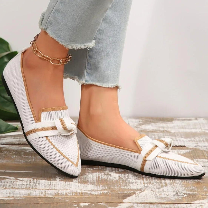 Women's pointed toe slip-on loafers with knot detail, comfortable & versatile for everyday wear.