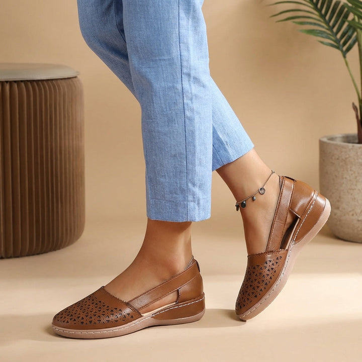 Comfortable women's casual loafers, featuring unique side cut-outs and a breathable design for everyday style.
