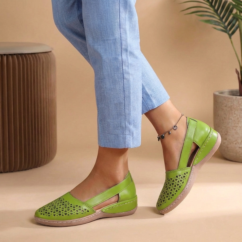 Versatile women's loafers with breezy side cut-outs, ideal for smart-casual outfits and all-day comfort.