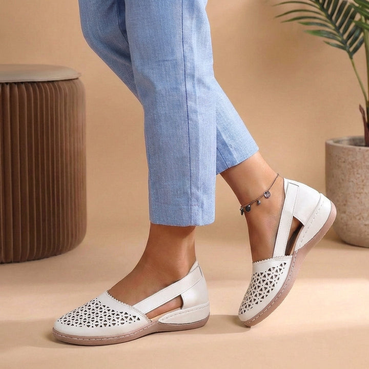Everyday women's loafers with a perforated look and side cut-outs, ensuring maximum comfort and breathability.