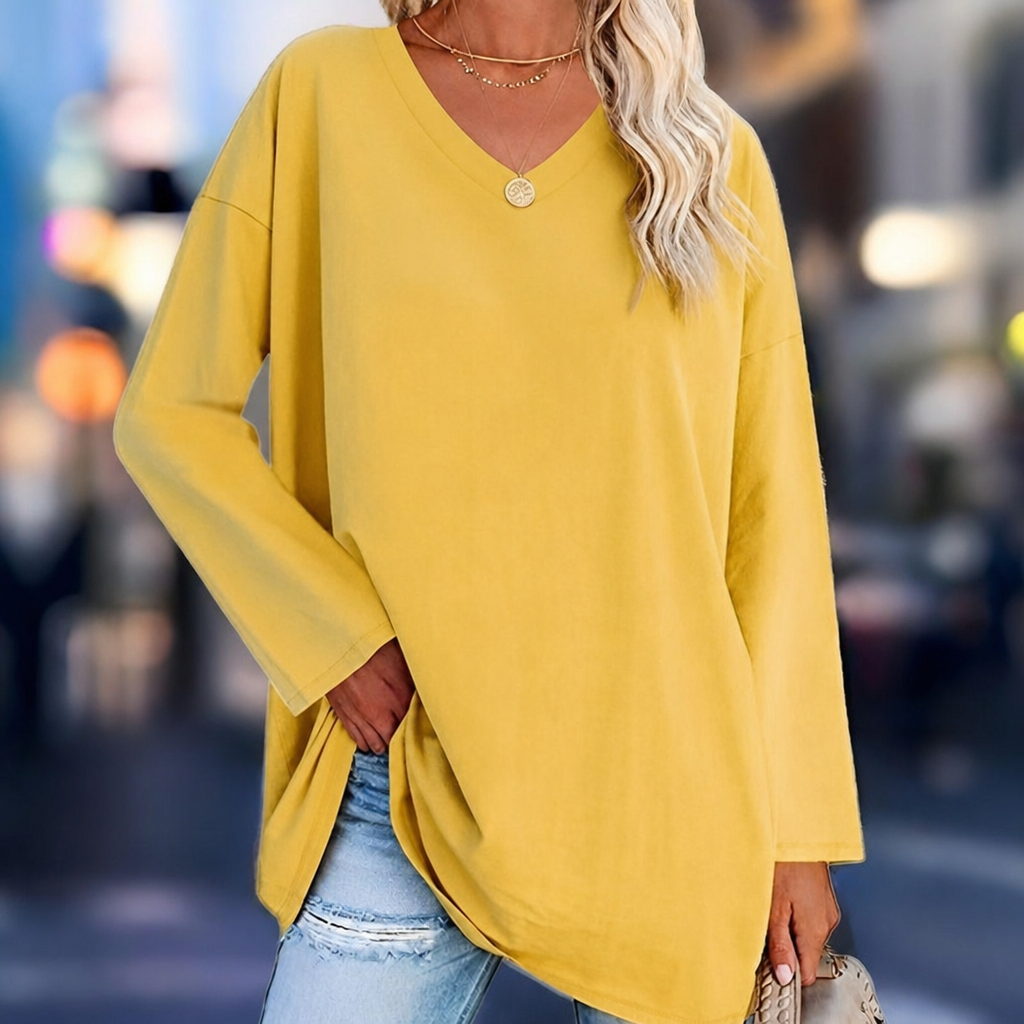 Women's oversized V-neck long sleeve top in a relaxed fit for comfortable everyday style.