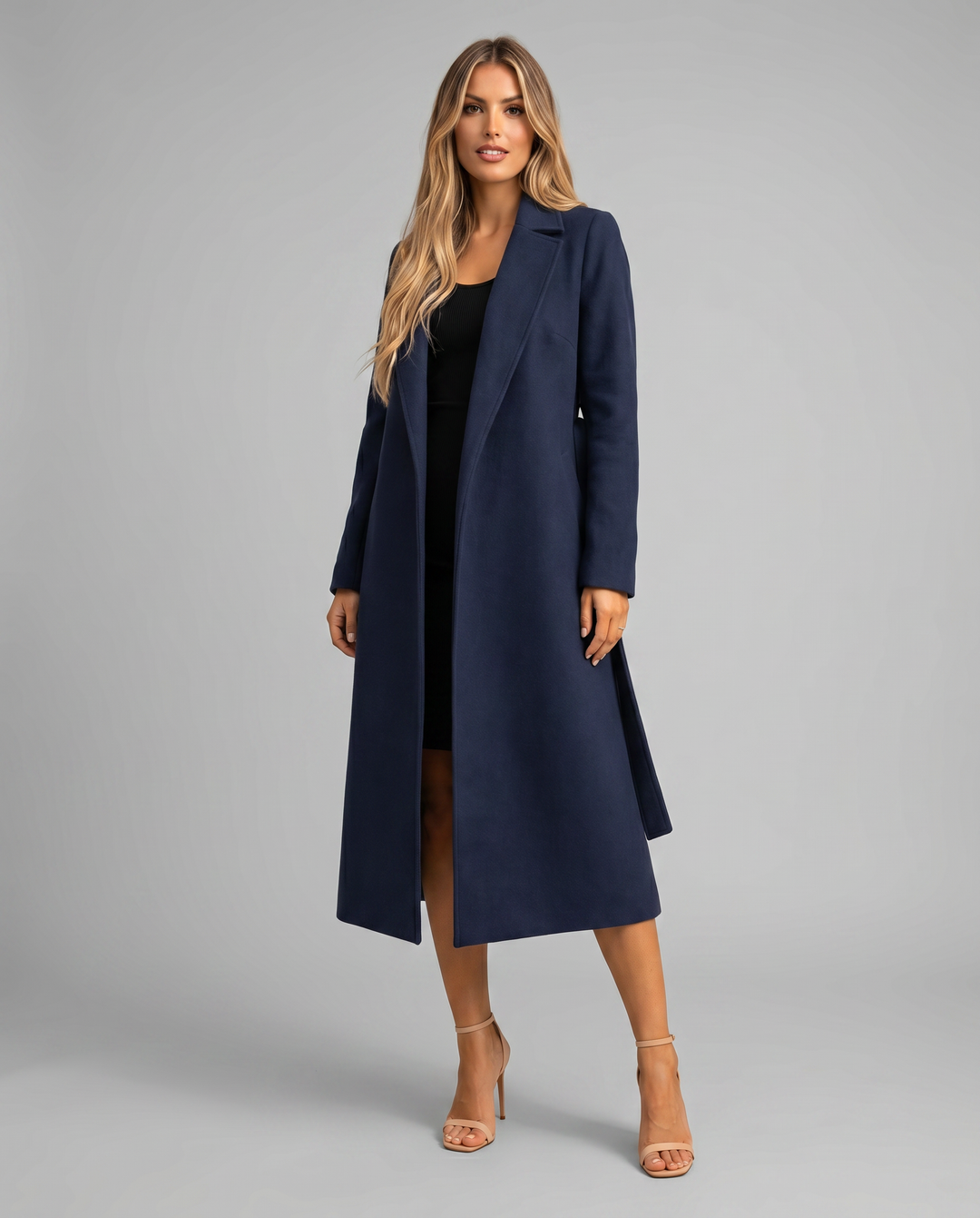 Women's long trench coat with a stylish tie belt & classic notched lapel. Elegant outerwear for versatile fashion.