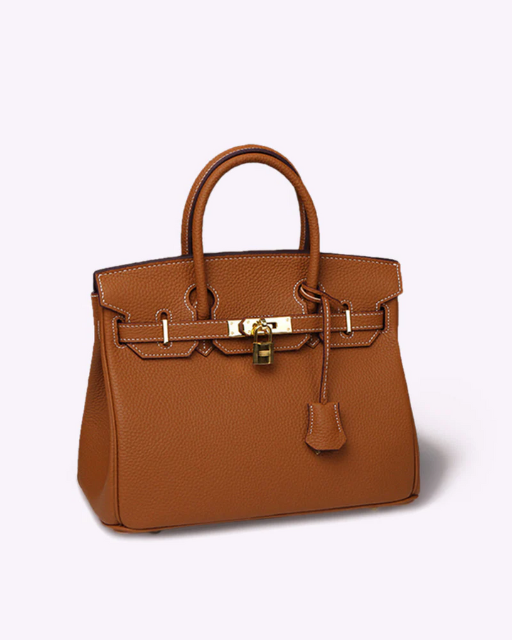 Genuine leather women's tote bag. Elegant luxury handbag for business travel or everyday fashion.