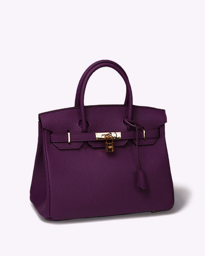 Sleek women's genuine leather tote bag. Elegant luxury shoulder bag, ideal for stylish work and travel.