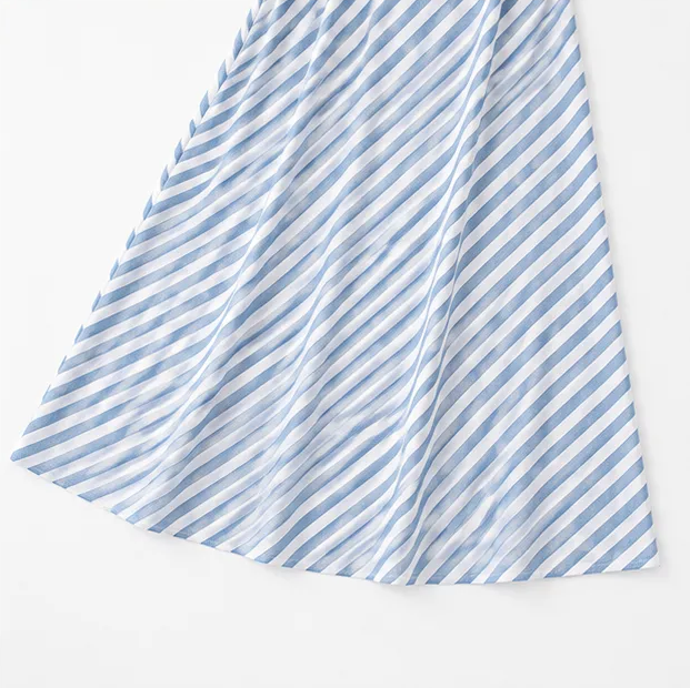 Fashionable women's party maxi dress, one-shoulder design with a playful puff sleeve.