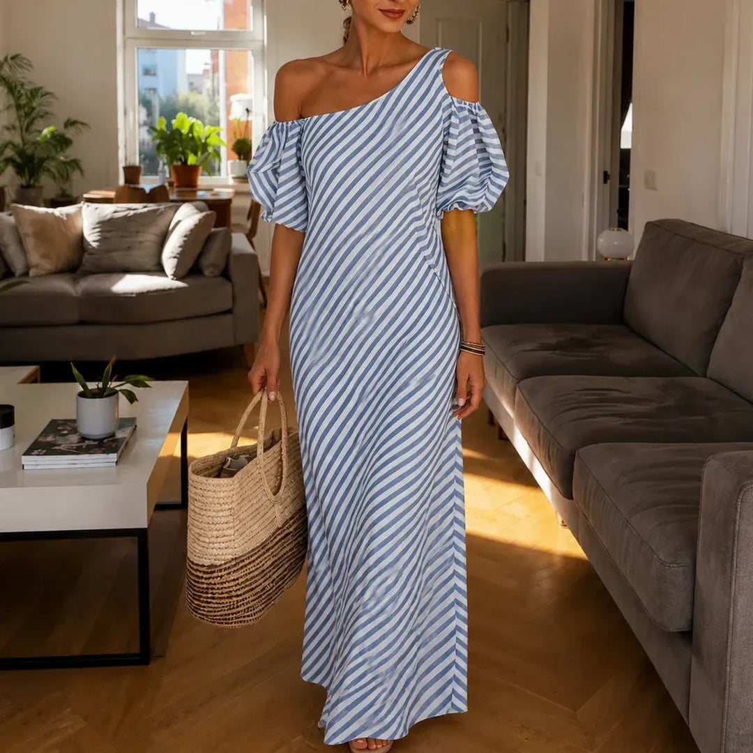 Elegant women's one-shoulder maxi dress with puff sleeve, perfect for special occasions.