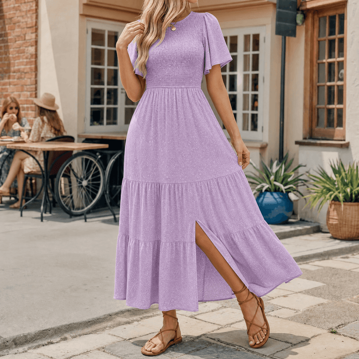 Resort wear women's smocked maxi dress, comfortable and stylish with flutter sleeves, long length.