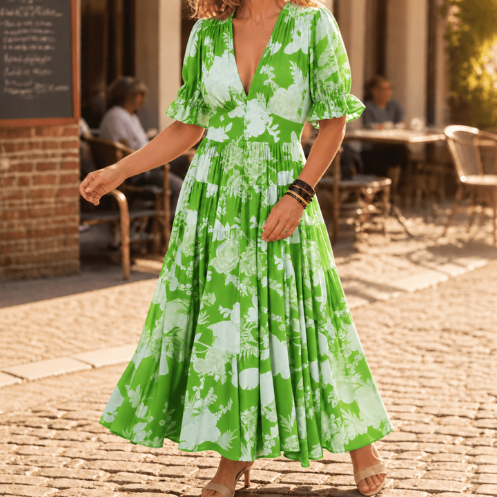 Boho chic floral V-neck maxi dress, flowing tiered skirt, ruffle sleeves, elegant women's fashion.