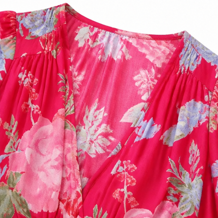 Women's fashion floral V-neck maxi dress, long tiered design for elegant spring/summer events.