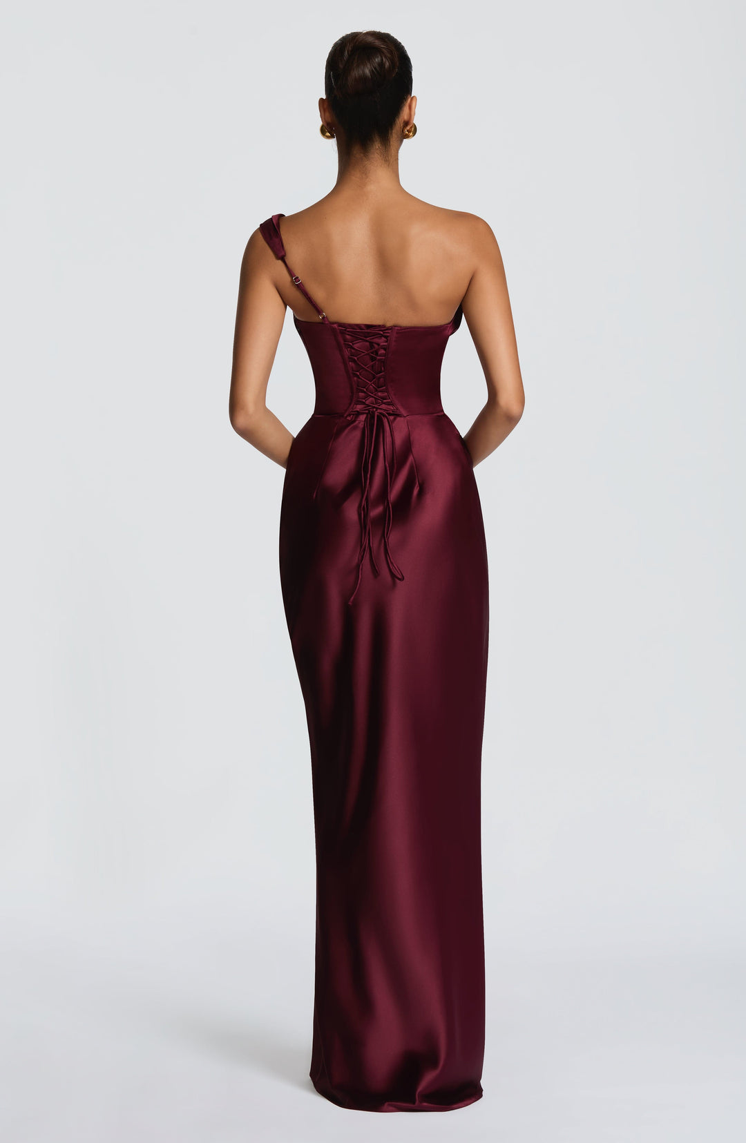 Elegant women's burgundy one-shoulder maxi gown, a stunning corset evening dress for special occasions or wedding guests.