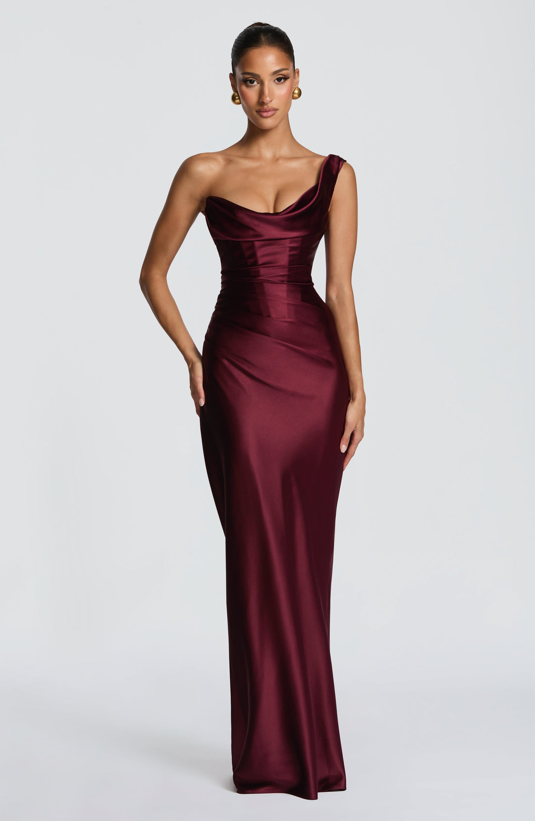 Women's burgundy one-shoulder corset maxi evening dress with a lace-up back, perfect for formal events & parties.
