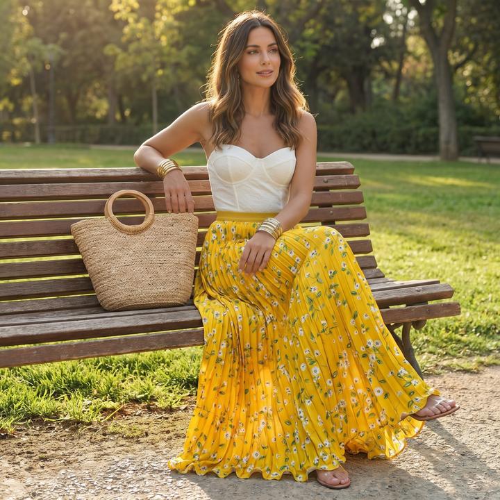 Chic women's long pleated floral maxi skirt with a beautiful flowy design, ideal for vacation.