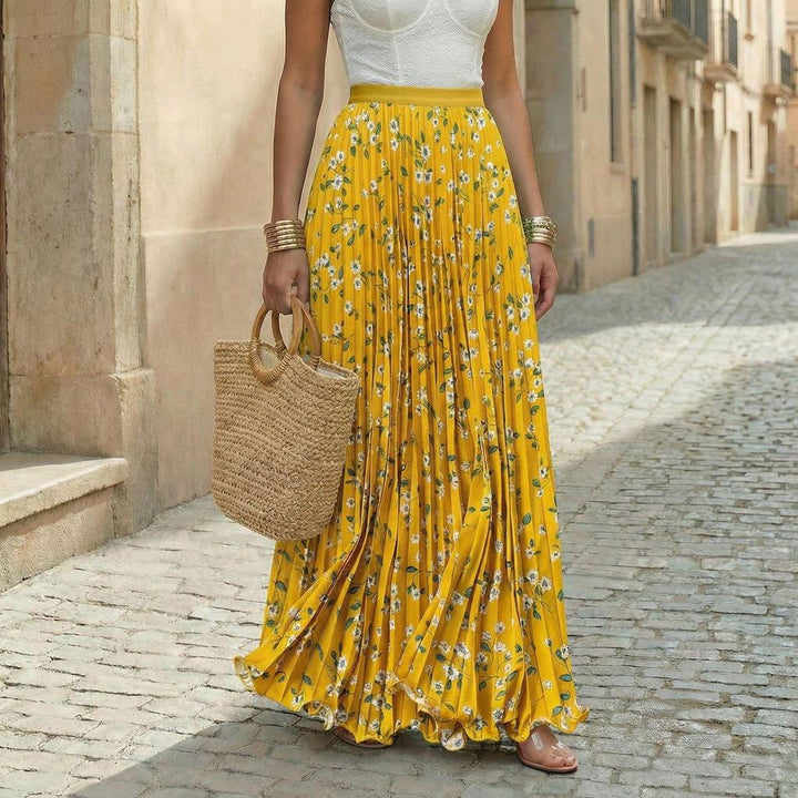 Women's elegant pleated floral maxi skirt, flowy style perfect for spring & summer fashion.