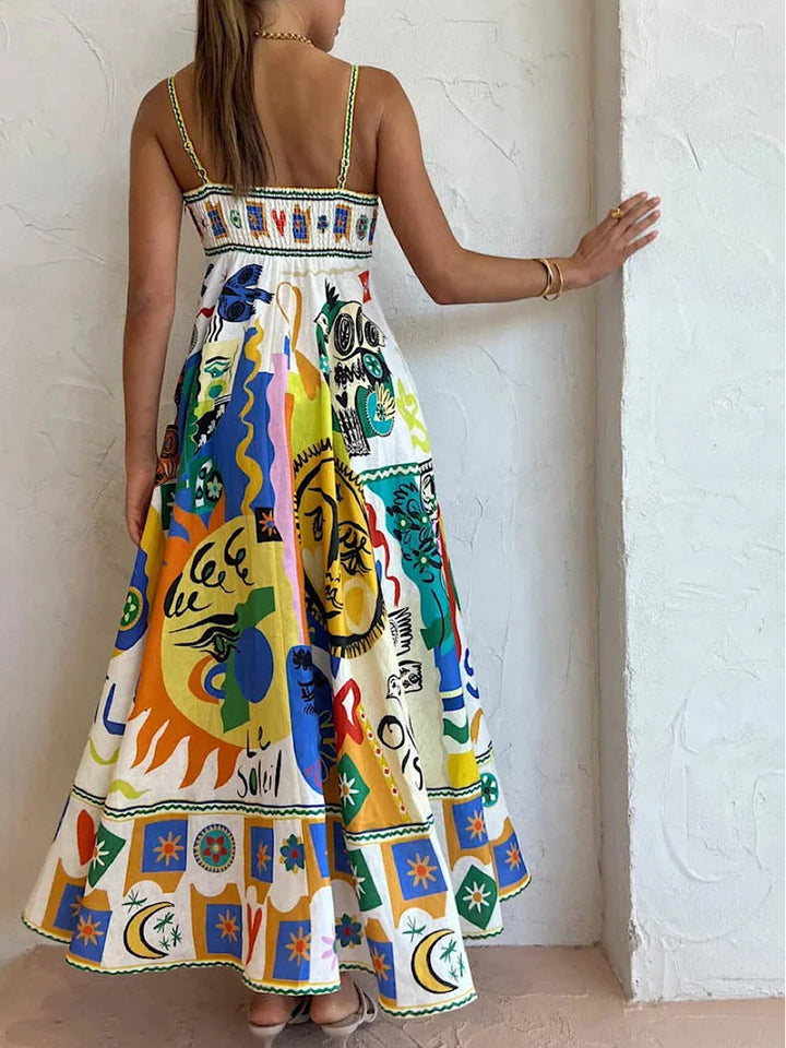 Elegant women's abstract print maxi sundress. Thin strap, flowing design, ideal for summer fashion & vacation wear.