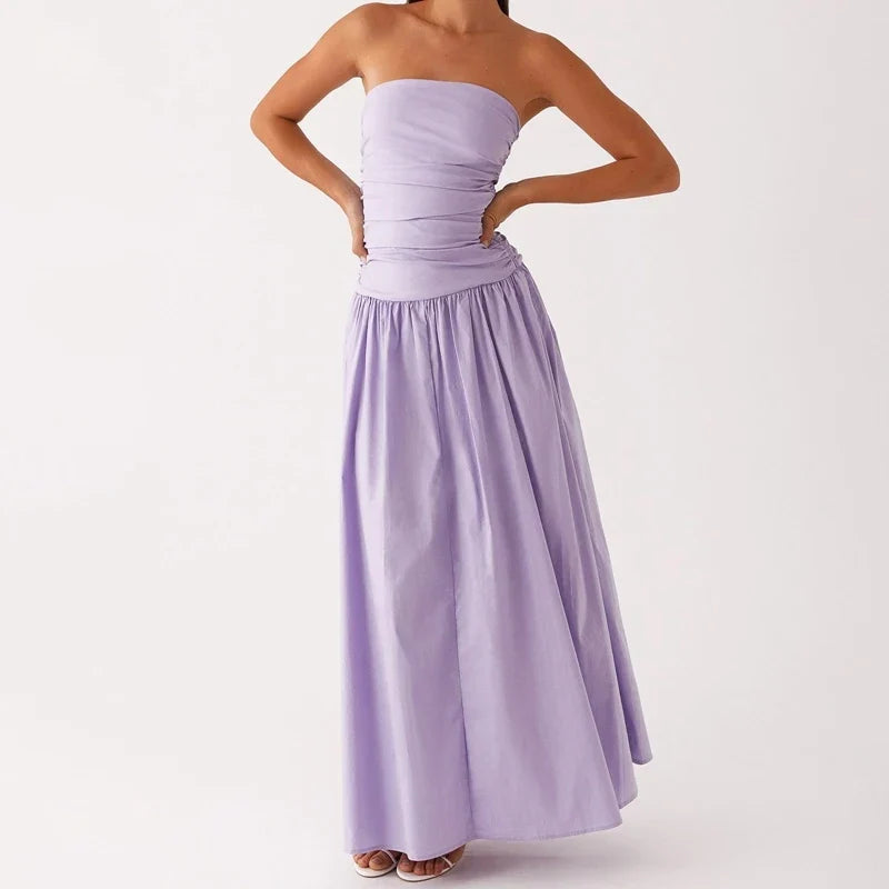Women's summer strapless maxi dress, printed for a vibrant look, ideal for beachwear or resort fashion.