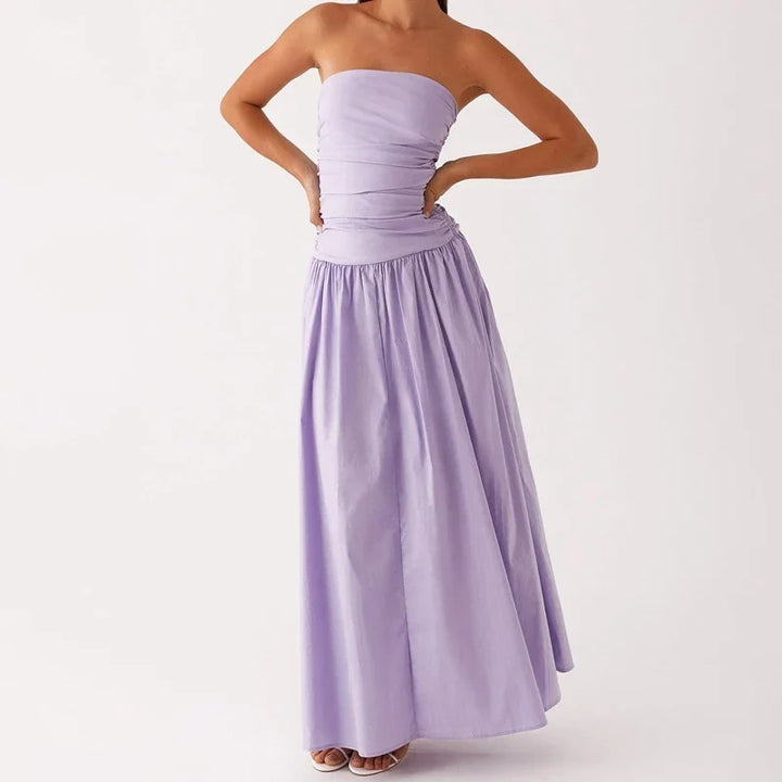 Women's summer strapless maxi dress, printed for a vibrant look, ideal for beachwear or resort fashion.