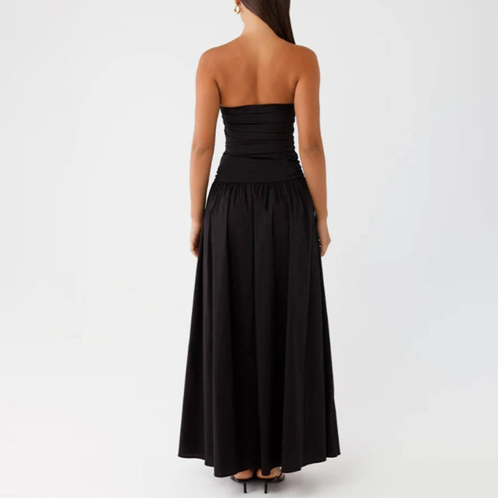 Flowy strapless maxi sundress for women, a beautiful long dress perfect for casual wear, beach, or vacation.