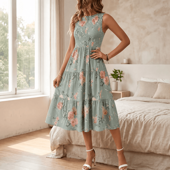 A-line floral midi dress for women, smocked and tiered, with a beautiful ruffle neck for spring.