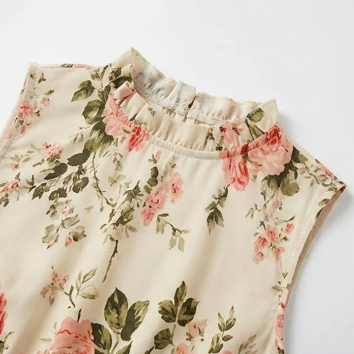 A-line women's midi dress with beautiful floral print, smocked details, and elegant tiered skirt. [[lstfy-media:8]]