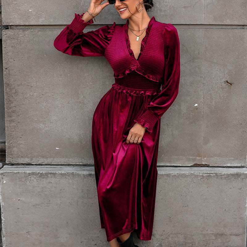 Stylish women's wine red V-neck long sleeve midi dress. Versatile occasion wear for elegant party looks.