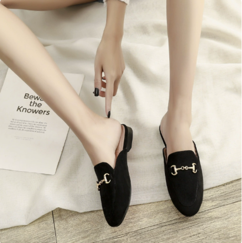 Elegant women's slip-on pointed toe mules with stylish chain buckle and block heel. Perfect for dress or casual.