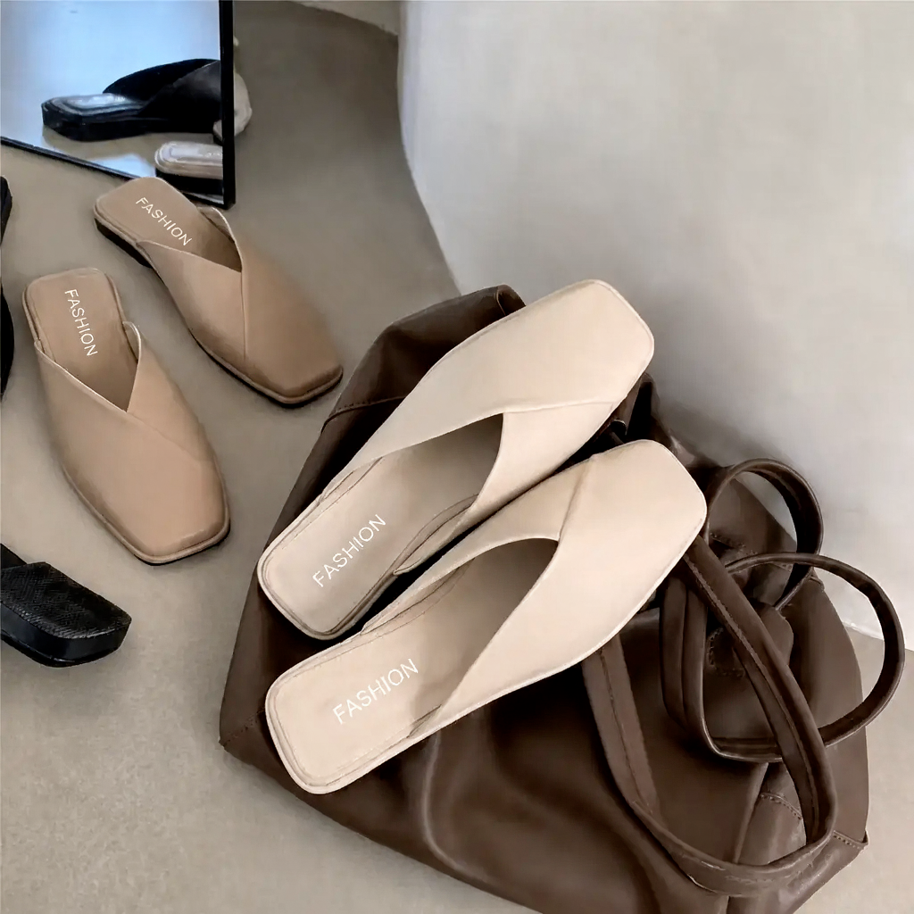 Comfortable women's slip-on mules with a trendy square toe design, great for casual footwear.