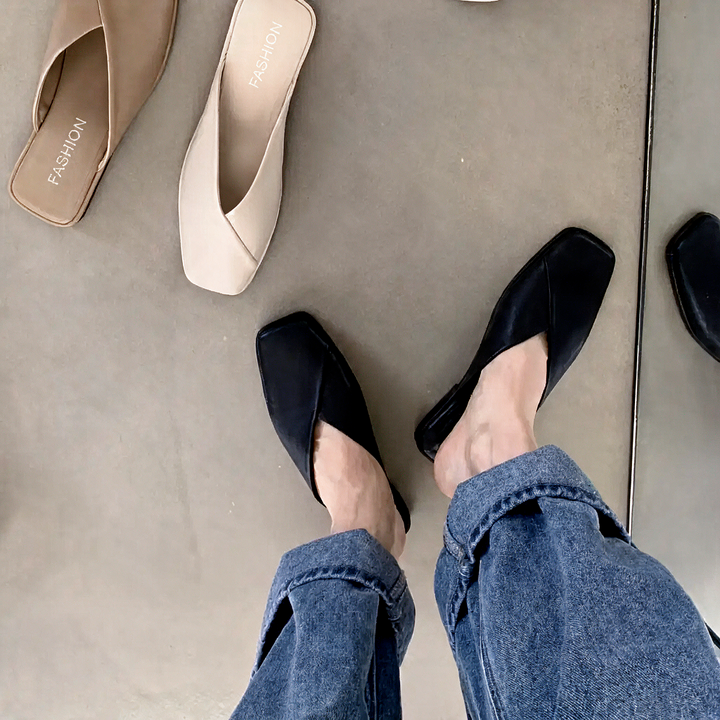 Versatile women's flat mules with a modern square toe, perfect slip-on shoes for effortless chic.