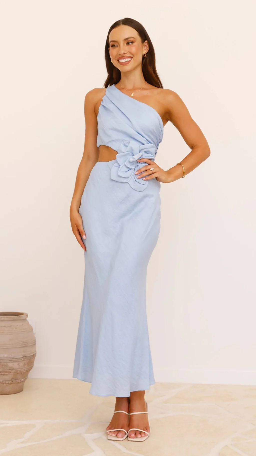 Women's elegant one-shoulder floral cutout dress, perfect for cocktail parties and special events.
