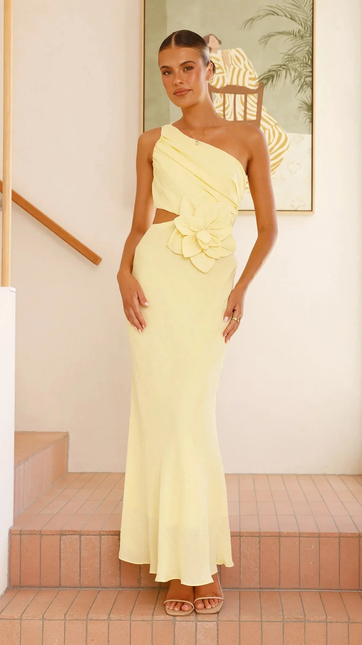 Sophisticated one-shoulder maxi dress with beautiful floral cutouts, perfect as a wedding guest dress.