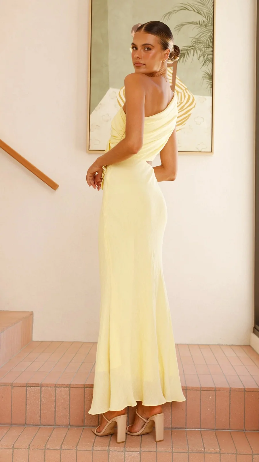 Asymmetric one-shoulder cocktail dress for women, showcasing an elegant floral cutout. Perfect for events.