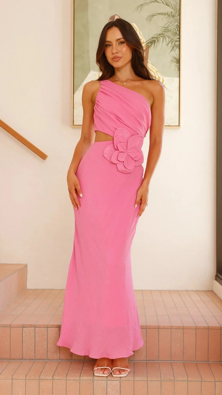 Close-up of the elegant floral cutout on a women's one-shoulder cocktail dress, ideal for parties.