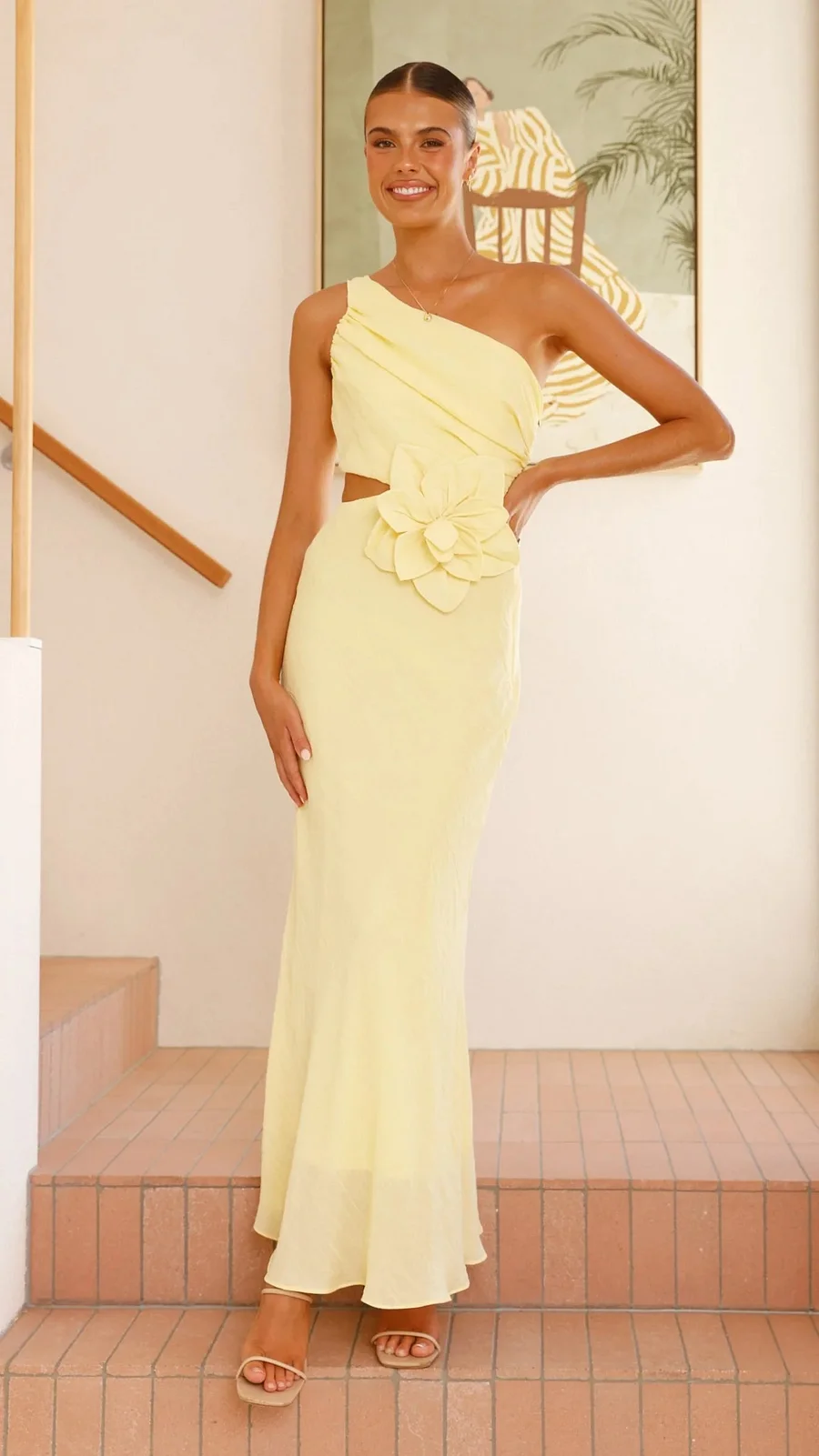 Women's elegant one-shoulder cocktail dress with chic floral cutout design. Ideal for special occasions.