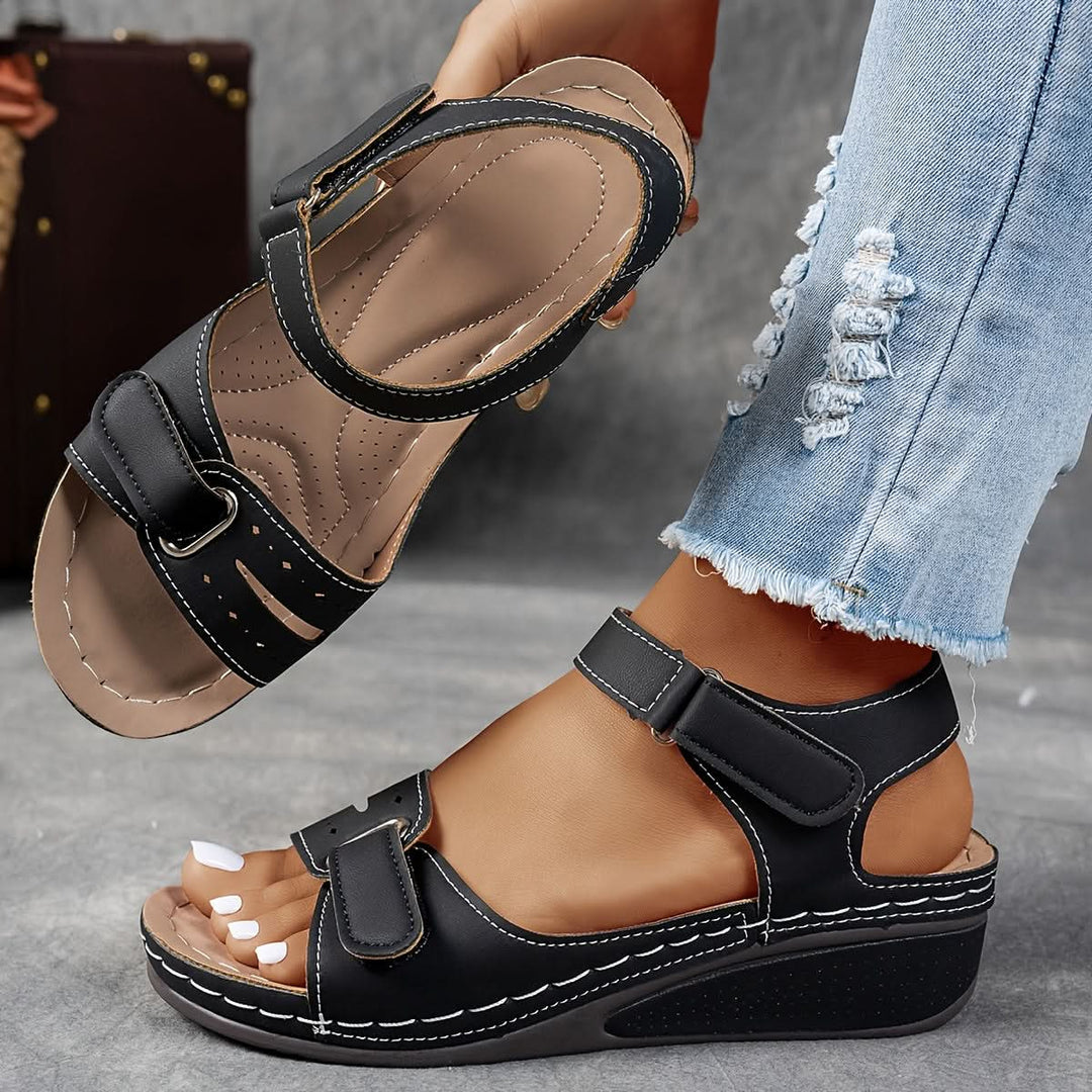 Comfortable women's open-toe wedge sandals, featuring a secure adjustable ankle strap for summer casual outings.
