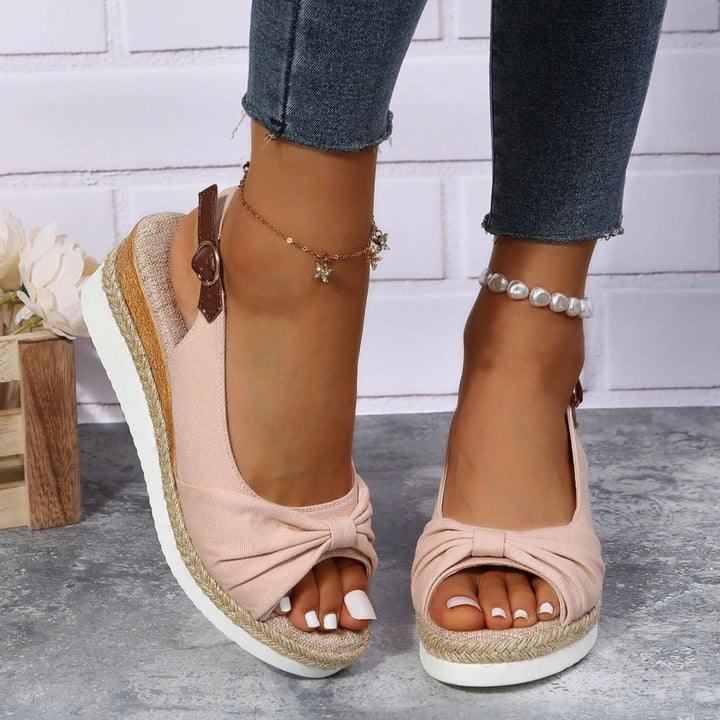 Stylish women's comfortable open-toe espadrille wedges. Ideal summer footwear with a chic platform design.