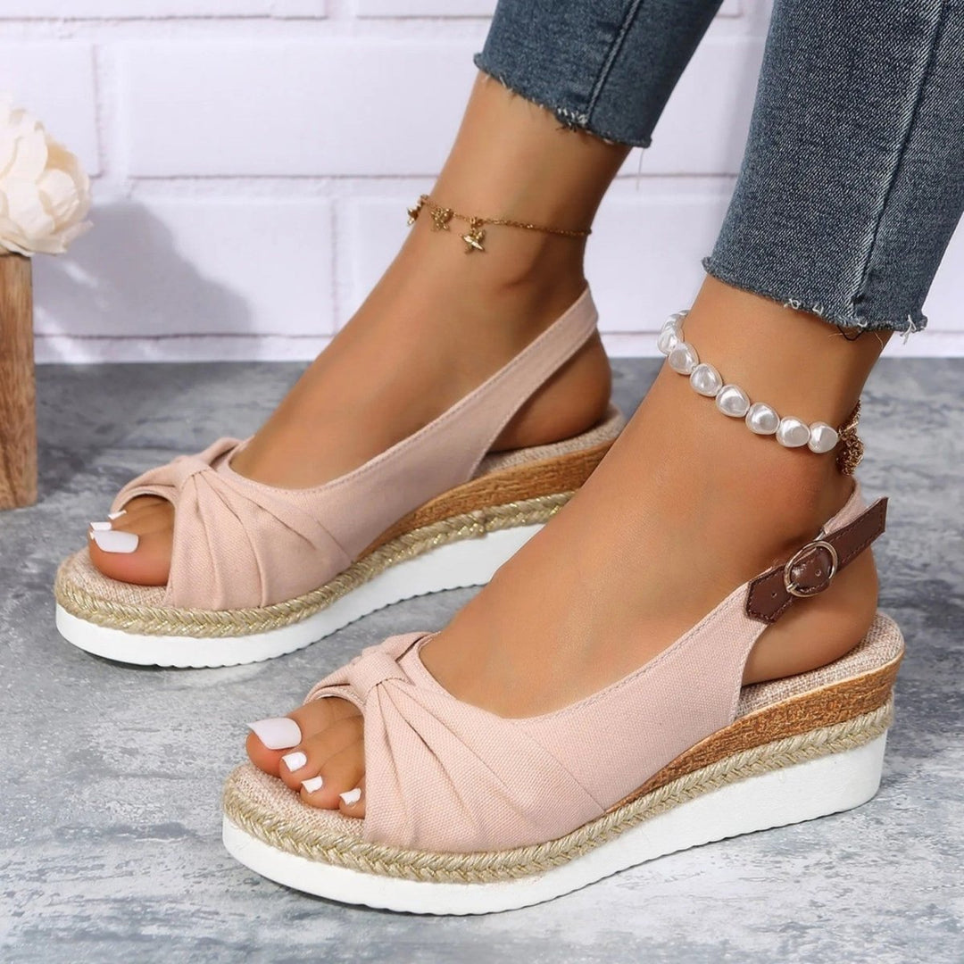 Women's comfortable open-toe espadrille wedges, perfect for summer casual fashion with a slingback strap.