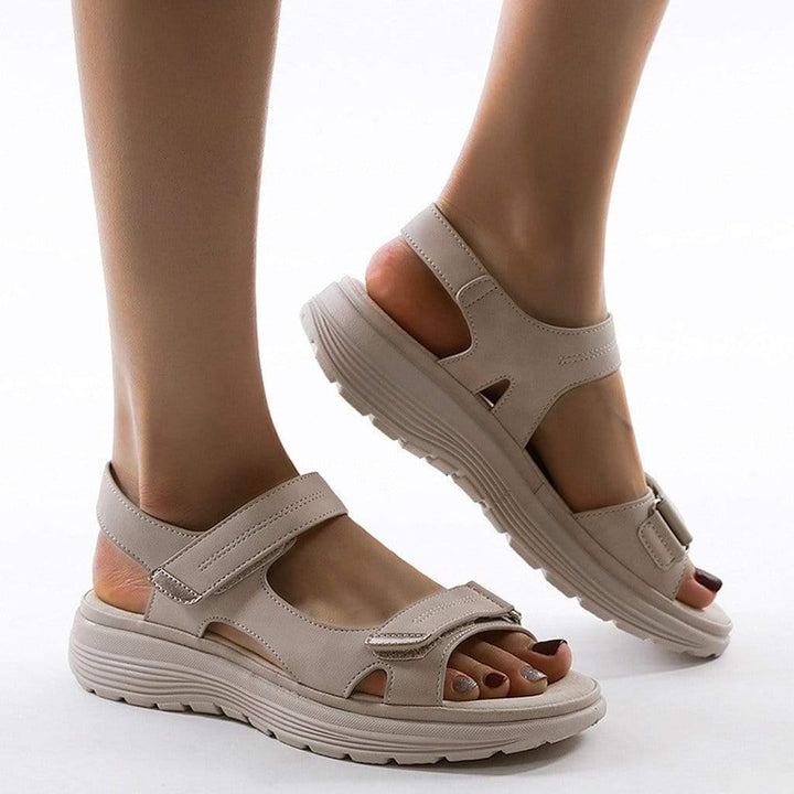 Stylish women's sport sandals with arch support, wide toe box, and adjustable straps for active wear.