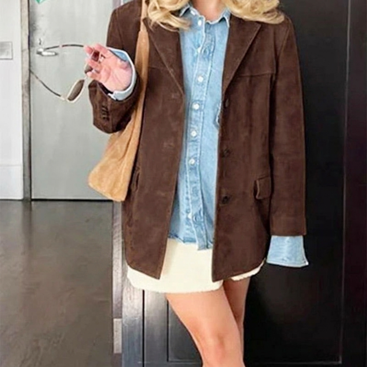 Chic oversized brown women's blazer with notched lapel. A versatile layering piece for modern office & casual styles.
