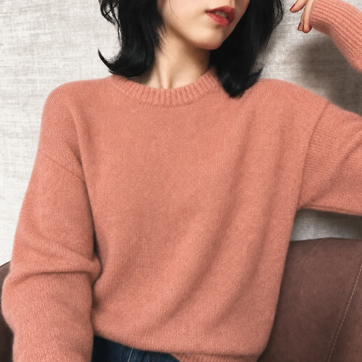 Soft, oversized fluffy women's jumper with comfortable crew neck & fashionable balloon sleeves. Relaxed winter style.